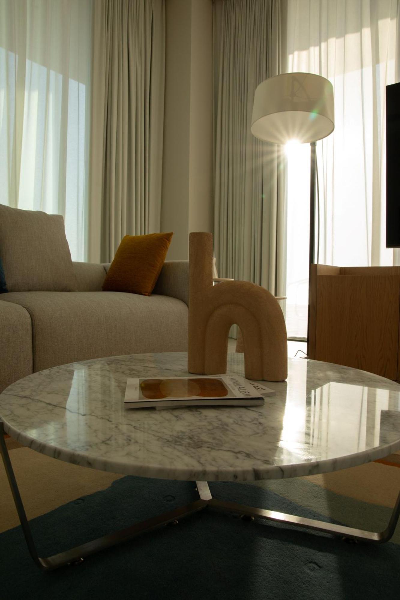 Ajman Hotel & Villas By Blazon Hotels Exterior foto A 3D rendering of a living room