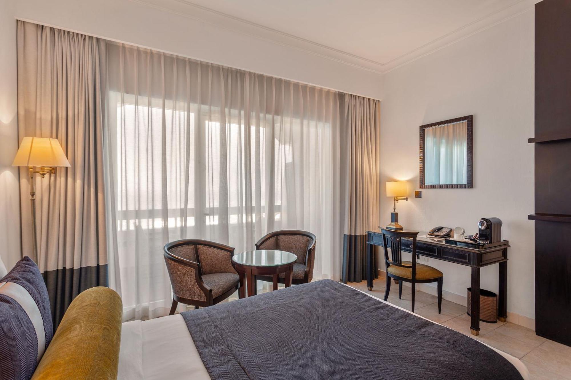 Ajman Hotel & Villas By Blazon Hotels Exterior foto A room at the hotel